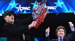 Elon Musk waves ‘bureaucracy’ chainsaw gifted by Argentina’s President Milei