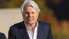 Ex-Abercrombie & Fitch CEO fit to stand trial, prison officials say