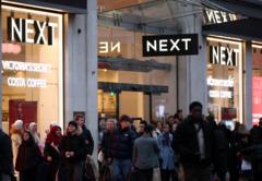 Next reports Christmas rush but warns of slowdown ahead