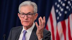 US Fed holds interest rates despite White House pressure