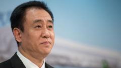 Founder of China’s Evergrande pleads guilty to fraud